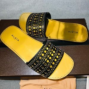 Alaia Laser Cut Leather Slides (NWT)!